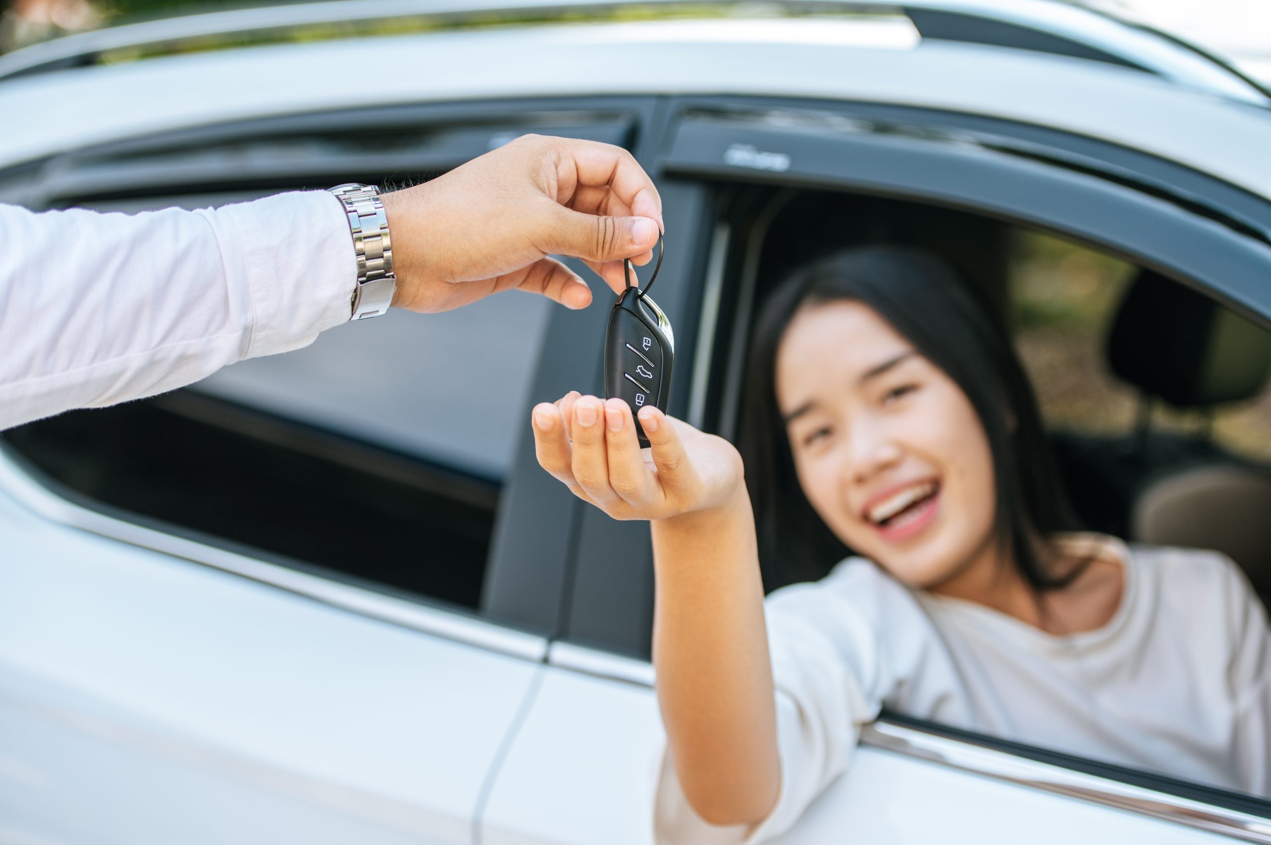 woman reaching for car keys